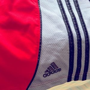 Size Large. Adidas athletic shorts. Red, grey, black. Great condition. Gym wear